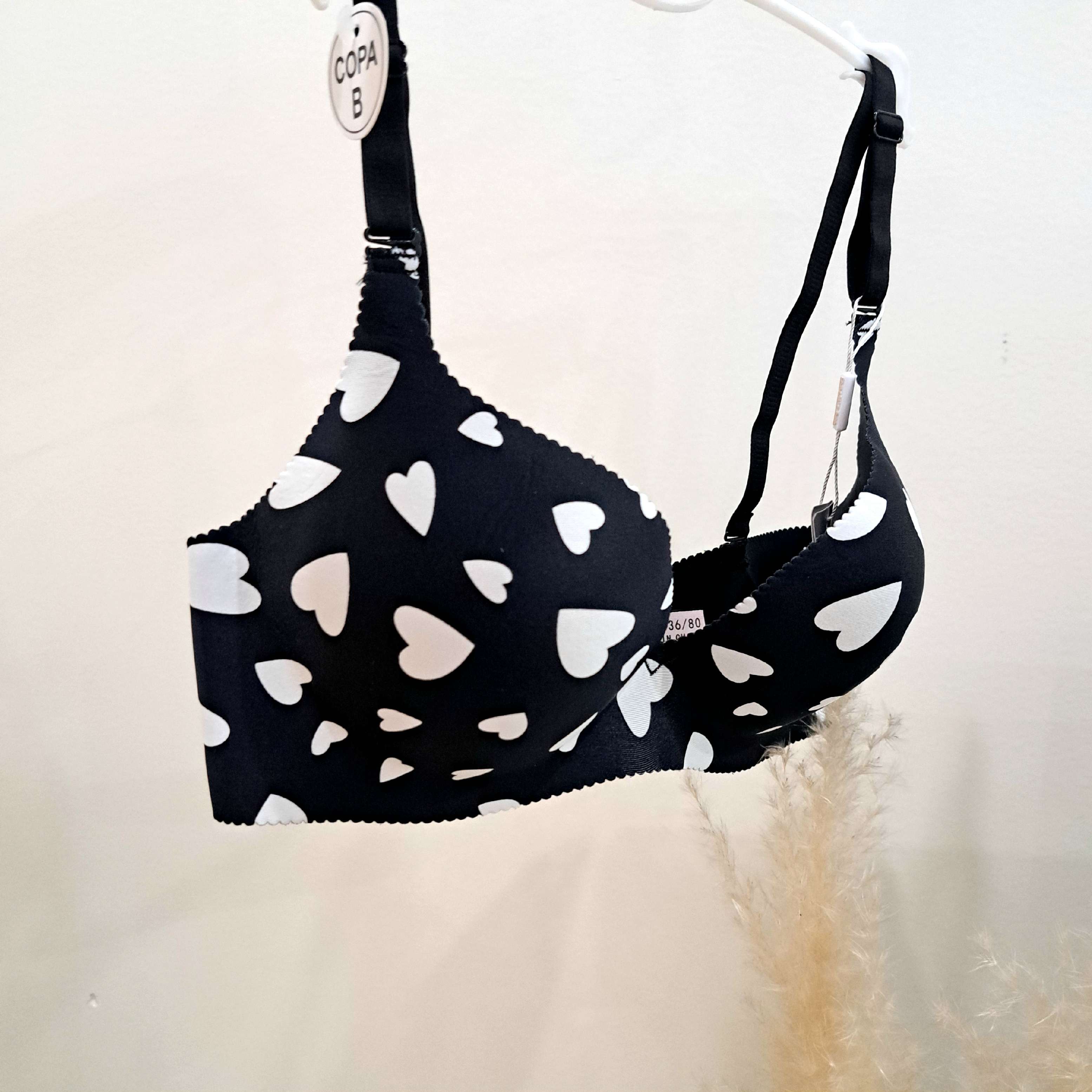 سوتین مشکی خال خالی